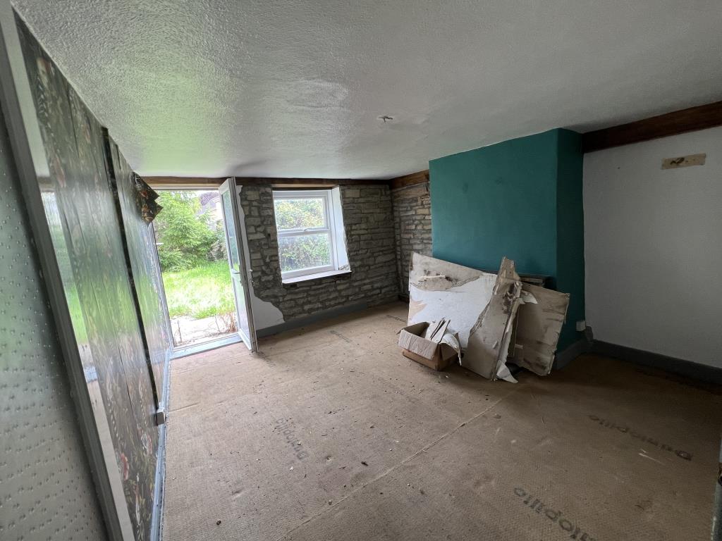 Lot: 50 - COTTAGE FOR COMPLETE REFURBISHMENT - General view of second reception room of property